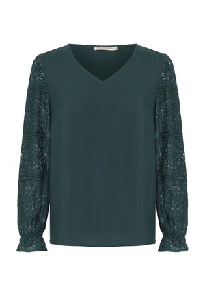 Donkergroene blouse met een V-hals, een effen voorkant en lange kanten mouwen met ingewikkelde patronen en verlaagde manchetten.