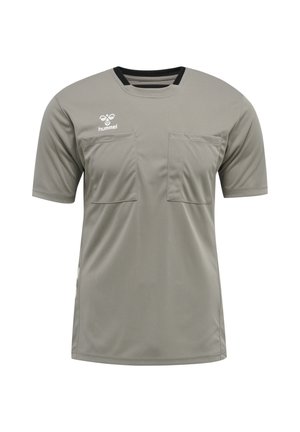 Chemise grise à manches courtes en tissu léger, dotée de deux poches à l'avant et d'un accent noir au niveau du col. Logo Hummel sur le coin supérieur gauche.