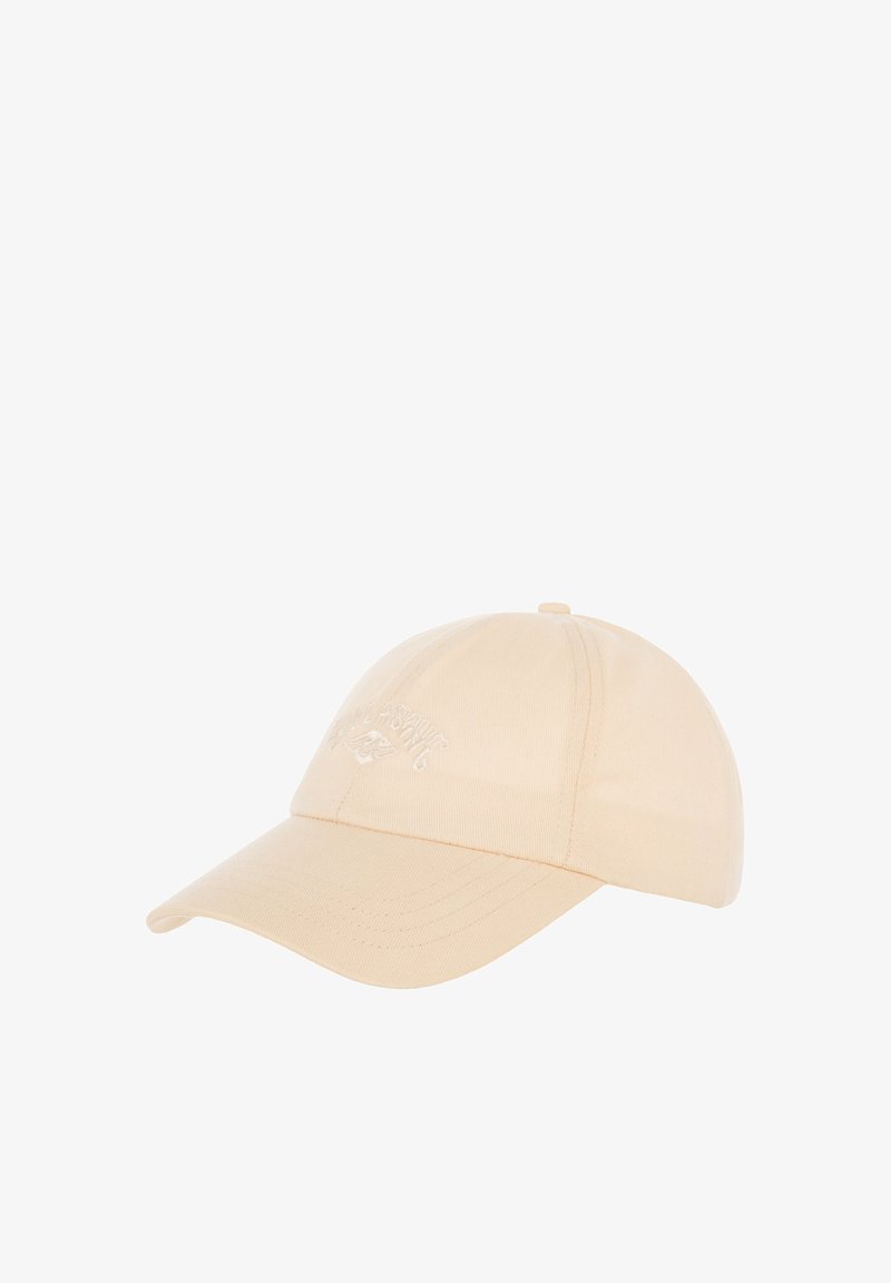 Beige cotton baseball cap with a structured crown, curved brim, and embroidered logo on the front. Features adjustable strap at the back.