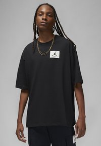 Jordan - M J FLT ESS OVRSZ SS CREW - Basic T-shirt - black Thumbnail Image 1