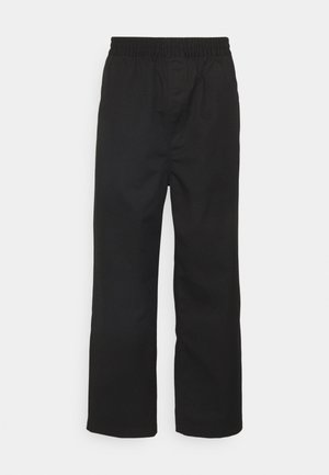 Pantalon noir à jambes droites avec taille élastique, sans poches ni ornements visibles, présenté sur un fond clair uni.