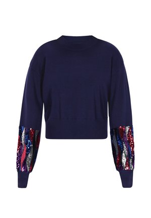 Pulover navy scurt cu mâneci lungi, decorat cu modele de valuri din paiete multicolore pe mansete. Textură fină și guler ribbit.