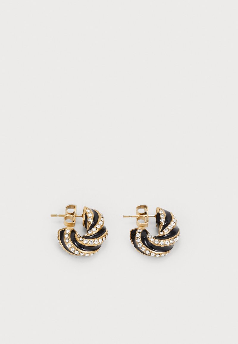 Goudkleurige hoepel oorbellen met zwarte emaille spiralen en witte steenaccenten. Ronde vorm, vastgemaakt met een pin en achteraansluiting.
