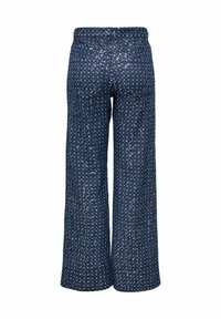 Pantalons larges en tissu bleu foncé avec un motif texturé de petits points argentés. Taille élastique et sans poches visibles.