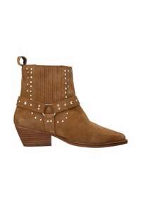 Suede ankle boots in brown, featuring a pointed toe, decorative silver studs, a belt strap with a metal ring, and a stacked heel.