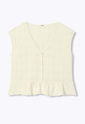 Crop top crème sans manches avec col en V, patte de boutonnage à l'avant, tissu ajouré et ourlet à volants.