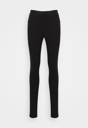 Black leggings featuring a smooth, stretchy material. High-waisted with subtle textured accents at the waistband and a fitted silhouette.
