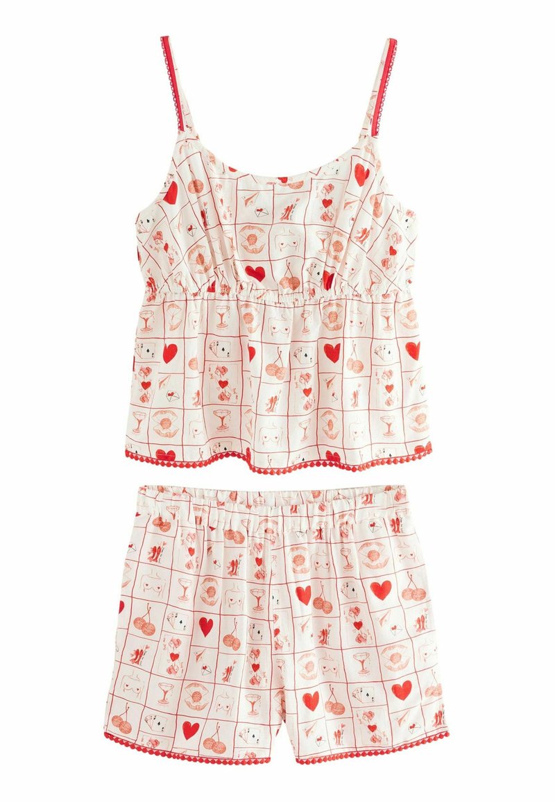 Ensemble de pyjama sans manches en rose pastel avec un motif graphique rouge comportant des cœurs et des icônes ludiques ; haut volant avec des shorts à taille élastique.