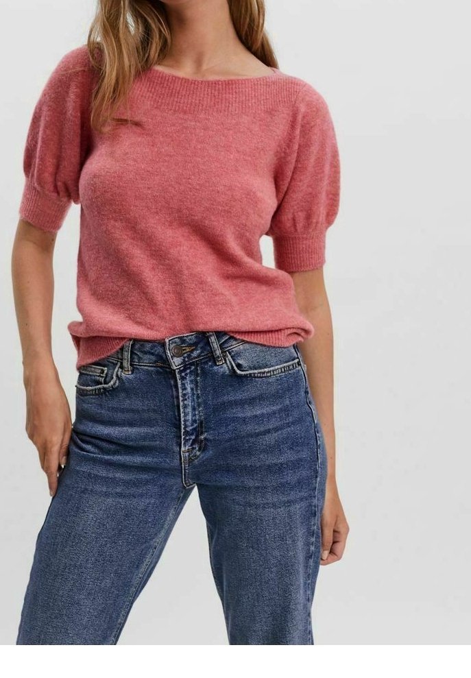 Light pink knitted sweater with short, puffed sleeves, paired with high-waisted blue jeans. Soft texture and relaxed fit.
