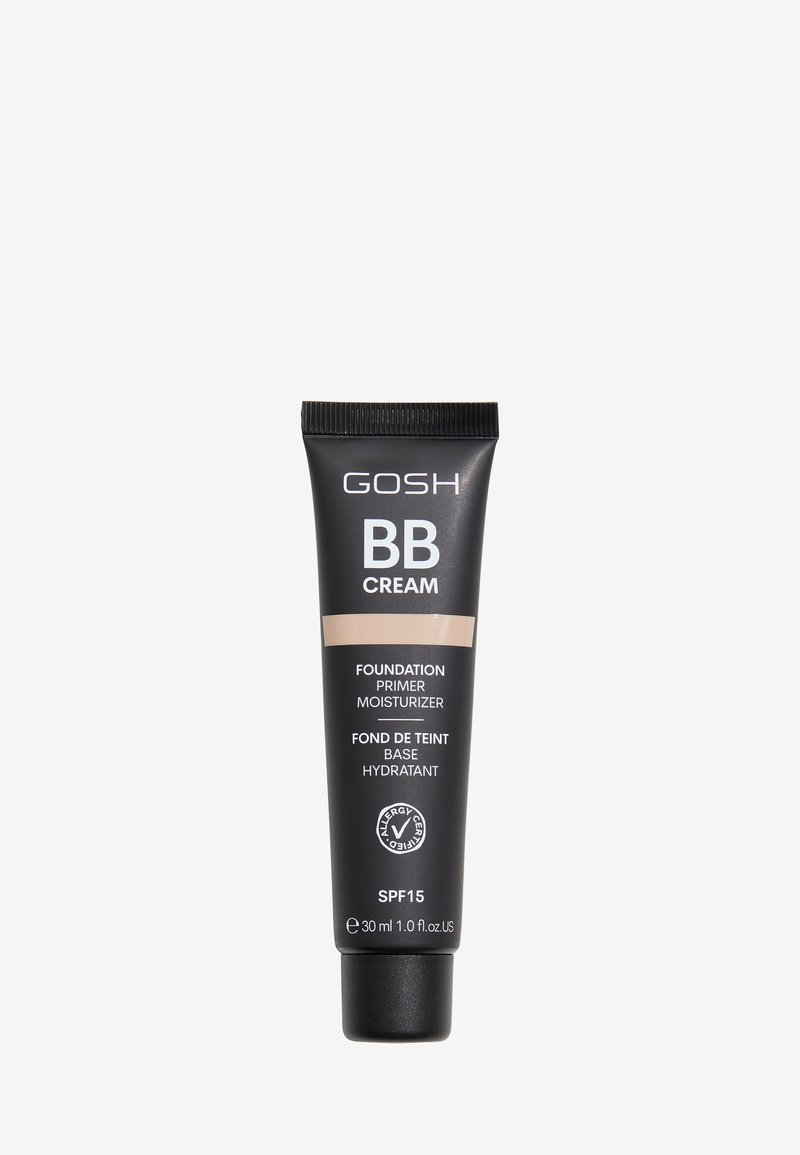 Zwarte tube met een matte afwerking, voorlabel met de tekst "GOSH BB CREAM," beige middenstuk, zwarte dop, 30 ml formaat, SPF 15, logo voor allergie-certificering.