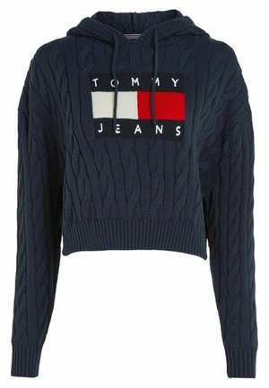 Sudadera con capucha corta de punto trenzado en azul oscuro con parche de logo tejido en blanco, rojo y negro que dice "Tommy Jeans" y cordones en la capucha.