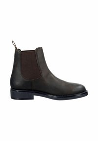 Bottines Chelsea en cuir marron avec des panneaux latéraux en élastique et une languette. Bout arrondi, semelle plate noire et détails de couture minimalistes.