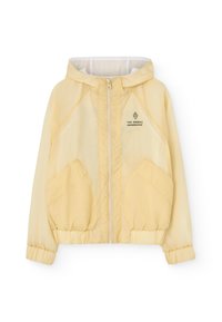 Seleccionado, pale yellow