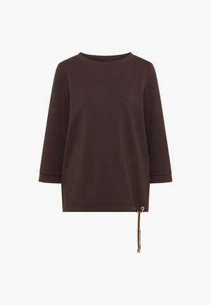 Tmavě hnědá košile s dlouhým rukávem, kulatým výstřihem a šňůrkou na stažení na dolní pravé straně.