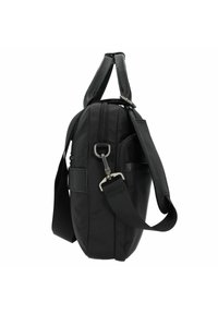 Bolsa de nylon negra con dos asas superiores y una correa para el hombro ajustable, cuenta con cierres de cremallera y un bolsillo lateral para almacenamiento.