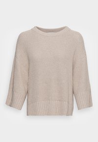 Maglione beige lavorato a maglia con vestibilità ampia, colletto rotondo e maniche a tre quarti. Tessuto testurizzato con dettagli a coste sull'orlo e sui polsini.