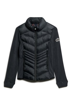 Veste noire avec un design de matelassage en chevrons sur le devant et des manches en polaire, dotée d'un col haut et de poches zippées.