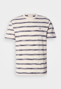 Tricou cu mânecă scurtă, în dungi, de culoare crem cu dungi orizontale neuniforme de culoare albastru marin, ce prezintă un mic logo pe piept. Material din bumbac moale.