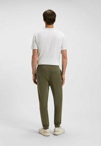 BOSS SESTART - Jogginghose - open green two