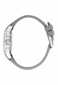 Silberner Edelstahl-Gehäuse mit einem grauen Silikonarmband. Verfügt über ein rundes Ziffernblatt und metallische Akzente, gesichert mit einer klassischen Schließe.