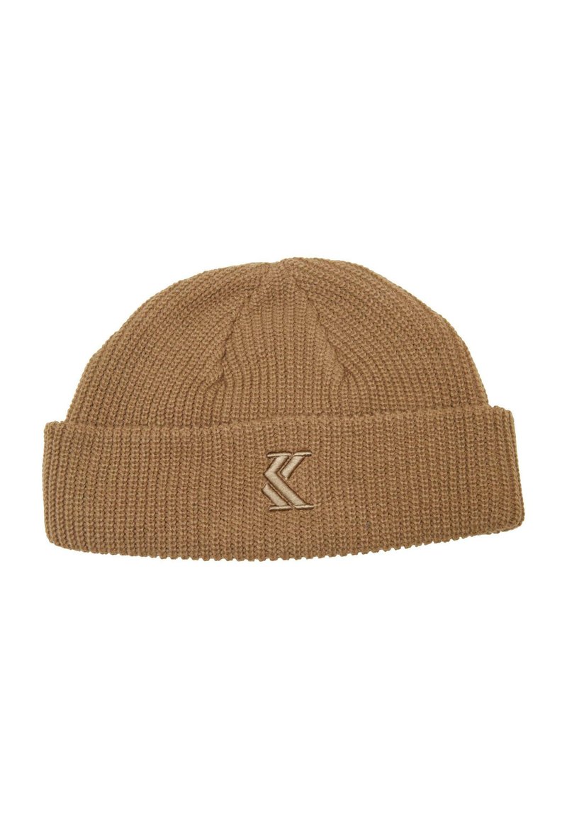 Brown knit beanie with a ribbed texture, folded cuff, and an embroidered logo on the front. Soft, stretchy material suitable for cold weather.