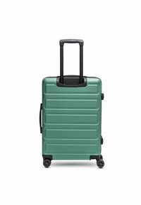 Valigia a mano rigida di colore teal con righe orizzontali, manico retrattile nero e quattro ruote per la mobilità. Design compatto e strutturato.