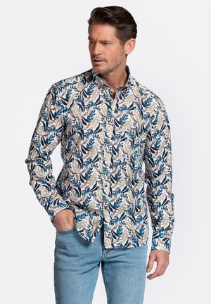 Chemise à manches longues boutonnée en blanc, avec un motif de feuilles bleu et marron ; tissu en coton avec un col classique et une coupe décontractée.