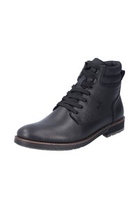 Botas de cuero negro hasta el tobillo con una puntera redondeada, que cuentan con cordones planos, un cuello acolchado y una suela de goma texturizada. Detalles de costura marrón.