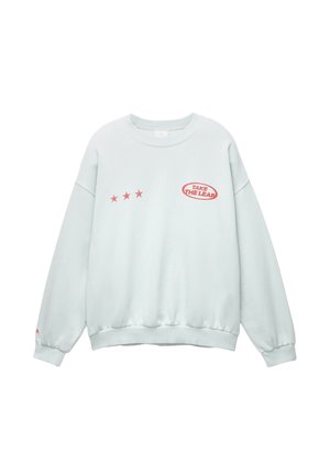 Mint green sweatshirt with long sleeves, ribbed cuffs, and hem. Features red text "TAKE THE LEAP" and three red stars printed on the front.