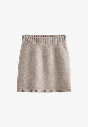 Pletená sukně ve světle béžové barvě, se žebrovaným pasem a měkkou strukturou. Jednoduchý rovný střih bez dalších vzorů nebo akcentů.