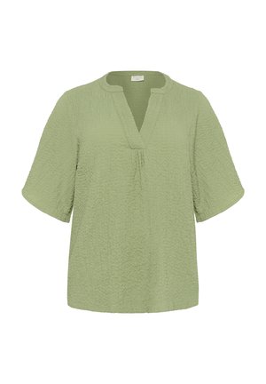 Light green, short-sleeve blouse with a textured finish, V-neckline, and slight pleat detail at the front. Casual, relaxed fit.
