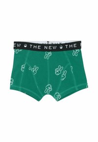 Zöld pamut boxeralsó fehér békejel mintával, fekete elasztikus derékpánttal, amelyen fehér betűkkel a "THE NEW" felirat olvasható.