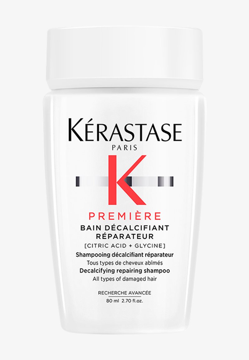 Bouteille de shampooing Kérastase Première Décalcifiant Réparateur pour tous types de cheveux abîmés, 80 ml, avec acide citrique et glycine.