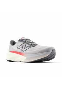Light gray athletic shoe with a mesh upper, rounded toe, and cushioned sole featuring a red accent on the heel and a dark rubber outsole.