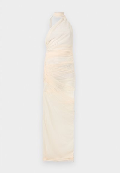 Long, cream-colored halter dress with ruched, sheer fabric and a high neckline against a plain background.