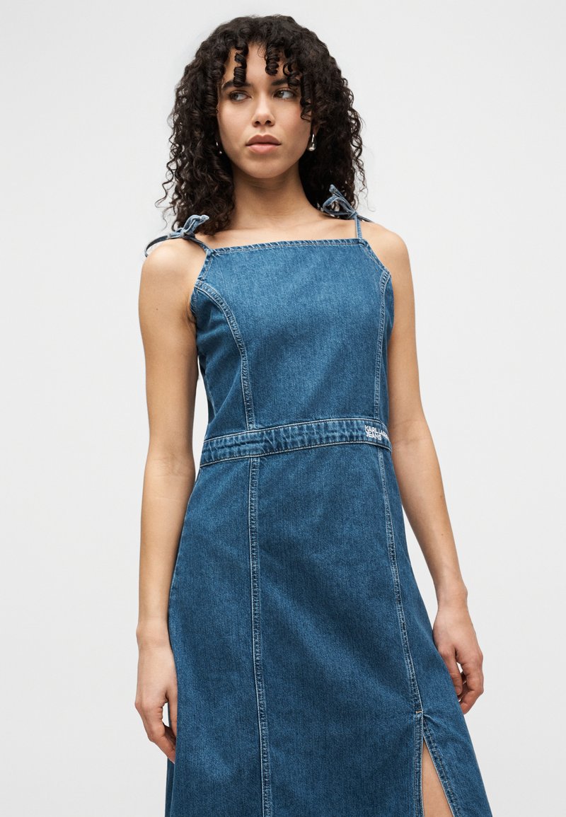 white christmas dresses Karl Lagerfeld Paris Women's Metallic Pinstripe Sleeveless Belted Midi-Dress - Denim Blue main image 1