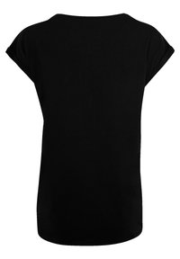 Black short-sleeve t-shirt made of soft fabric with a relaxed fit. Features a rounded neckline and a smooth texture. No visible patterns or graphics.