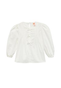 Blusa blanca con mangas abullonadas, cierres de botón con lazo, detalles plisados en la parte delantera y escote redondo. Material de algodón suave.