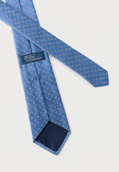 Μπλε μεταξωτό μαντήλι γραβάτα Polo από τη Ralph Lauren με μικρό επαναλαμβανόμενο μοτίβο σε λευκές και σκούρες μπλε οβάλ, εμφανίζεται σε λευκό φόντο.