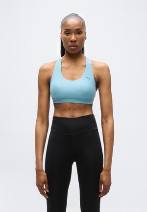 - Stanik sportowy z średnim wsparciem