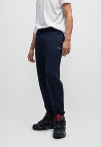 HUGO - DAYOTE - Tracksuit bottoms - dark blue Thumbnail Image 1