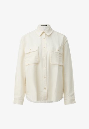 Veste chemise à manches longues de couleur crème avec fermeture frontale à boutons et poches poitrine munies de pressions dorées, dotée d'un col classique.