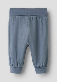 Blue corduroy pants with an elastic waistband, gathered cuffs, and a textured finish, designed for comfort and ease of wear.