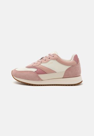 Pink and white women's sneaker with a combination of smooth leather and suede. Features a cushioned sole and round toe design.