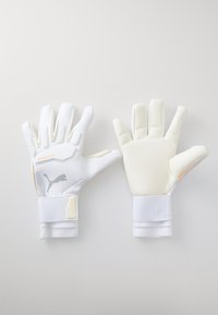 White goalkeeper gloves with textured latex palms, elastic wrist straps, and Puma logo. Includes padded finger protection and grip accents.