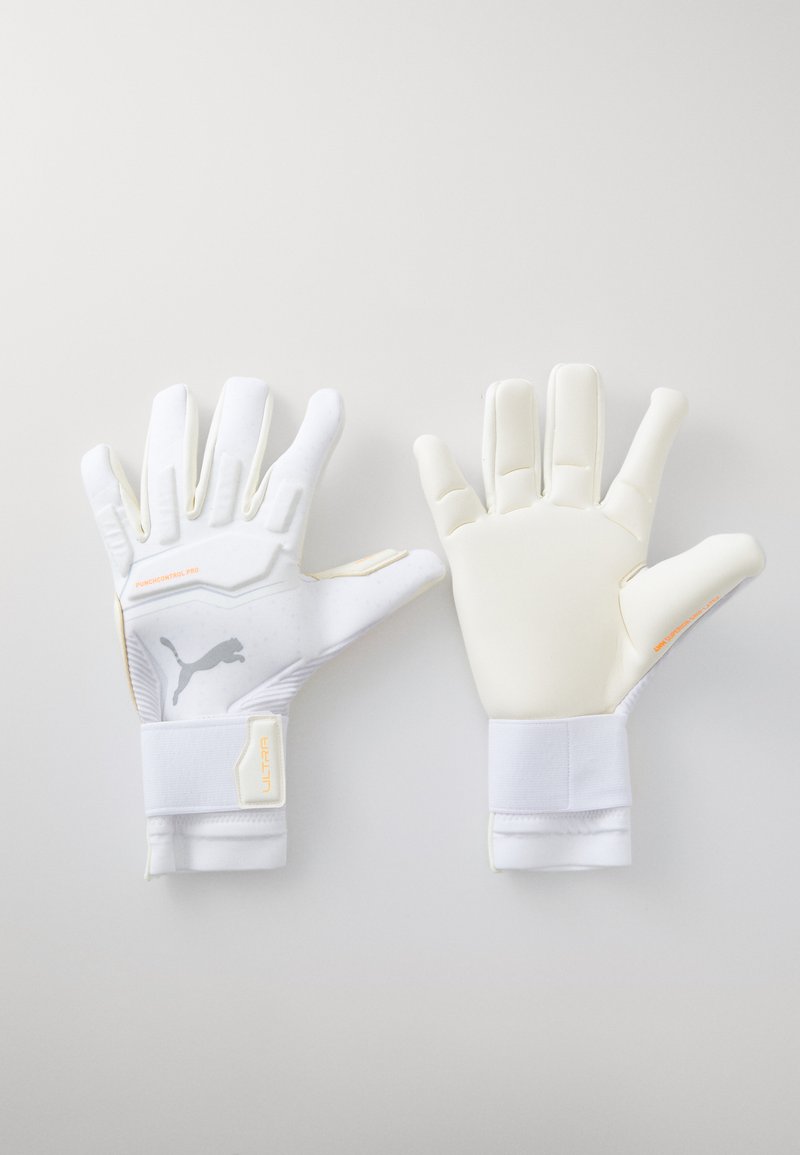 White goalkeeper gloves with textured latex palms, elastic wrist straps, and Puma logo. Includes padded finger protection and grip accents.