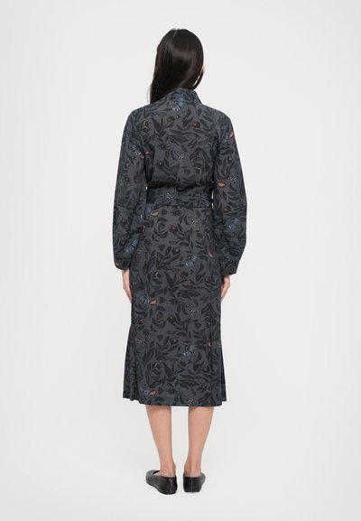 Long-sleeve, dark gray dress featuring a floral pattern in blue, orange, and white, with a belted waist and straight cut at the hem.
