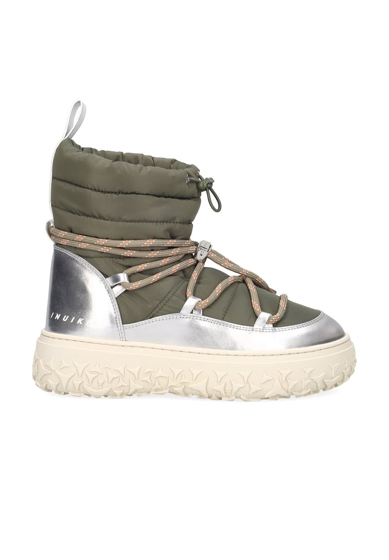 Green puffy ankle boot with silver accents, textured sole, and patterned laces. Features a plush upper and thick, rubberized outsole.