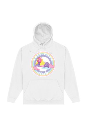 Hvid hættetrøje med kappe, der har et cirkulært grafik med to tegneserie-bjørne, farverige detaljer og teksten "self-care club". Inkluderer frontlomme.
