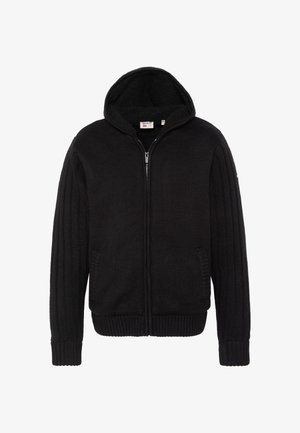 Czarna bluza z zamkiem, wykonana z teksturowanej dzianiny, z dużym kapturem, ściągaczami na rękawach i bocznymi kieszeniami. Prosty i funkcjonalny design.